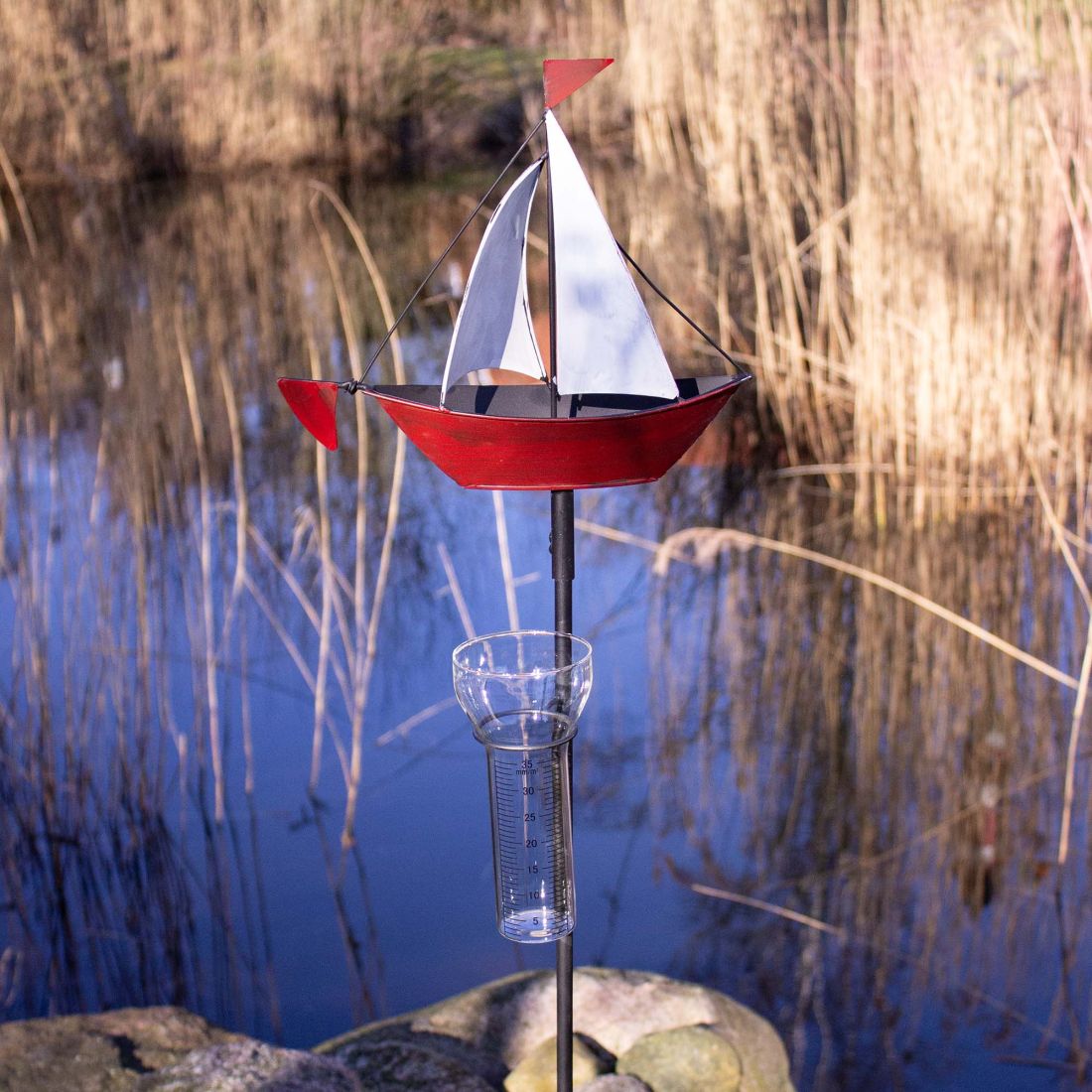 Regenmesser Segelboot rot