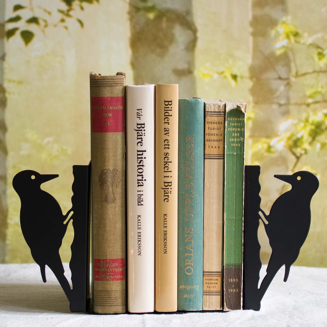 Buchstütze Specht Silhouette, links