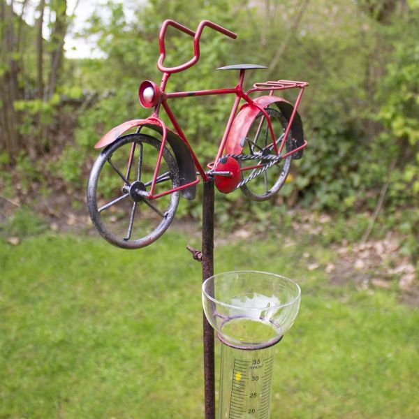 Regenmesser mit Fahrrad rot