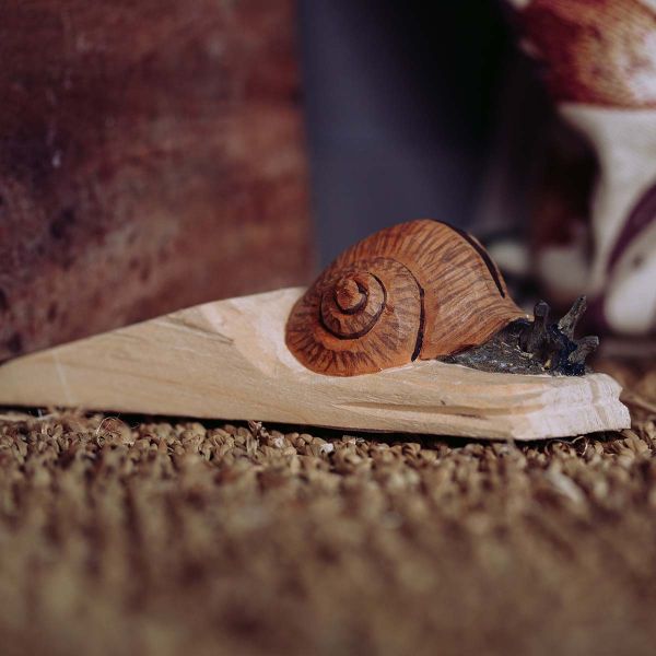 Türstopper Schnecke handgeschnitzt